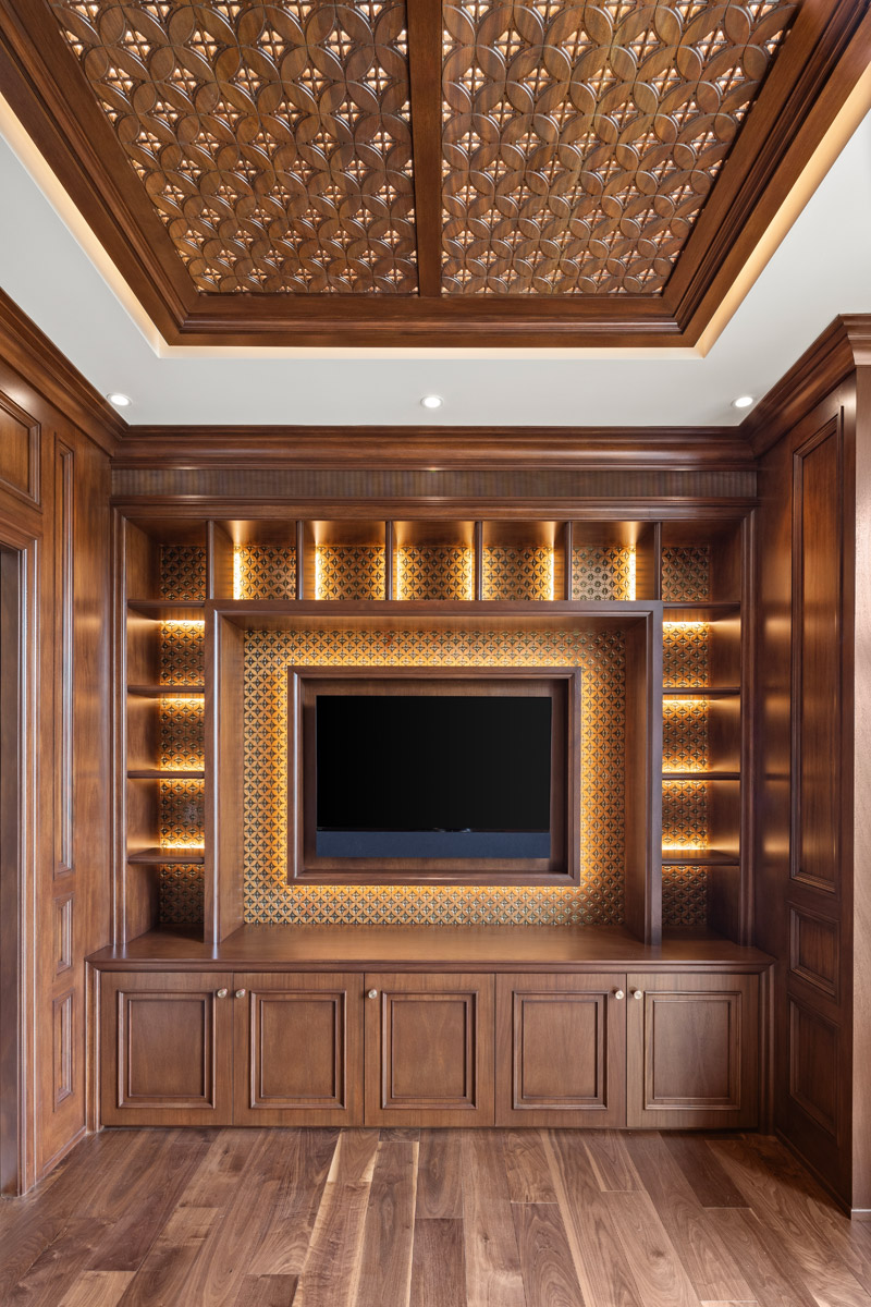 Mahogany Office with Integrated Lighting and Textured Panels